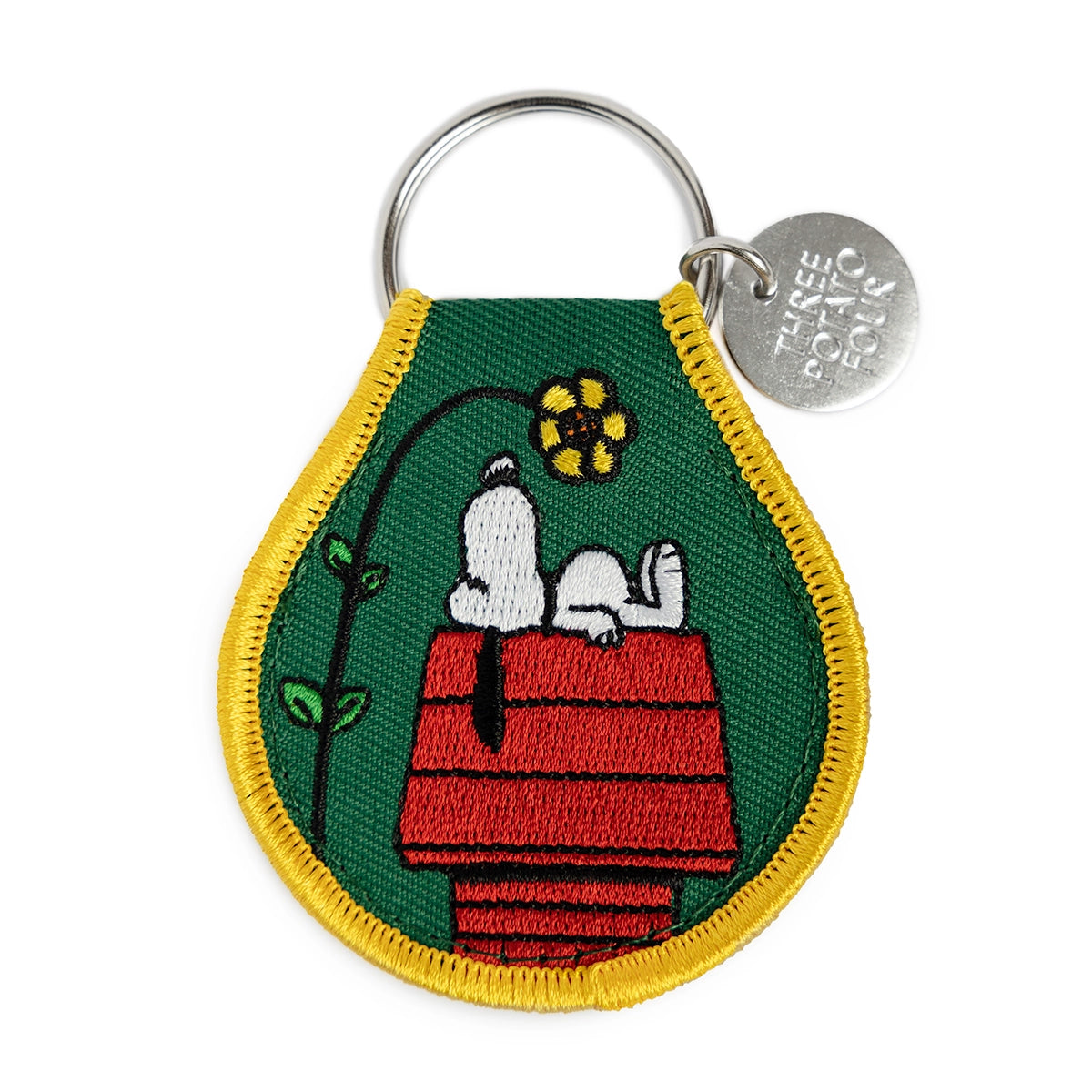 Snoopy embroidered keychain on red doghouse with flower – front view