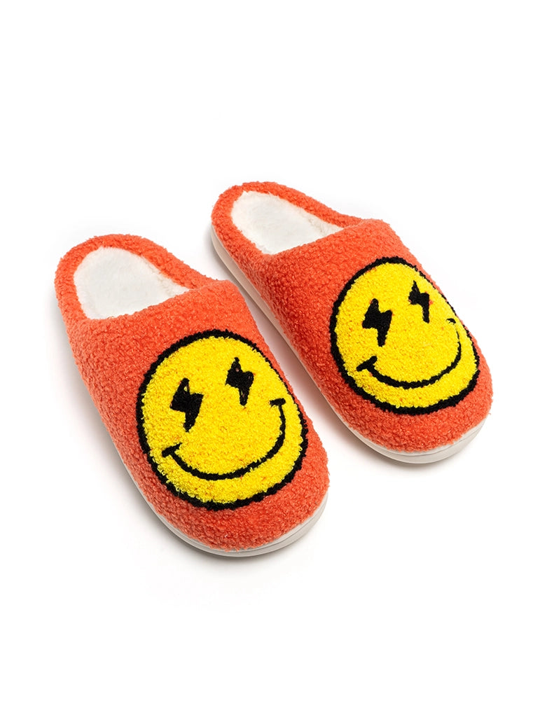 Cozy Smiley Face Slippers – Orange Fuzzy House Shoes with Lightning Eyes (Indoor/Outdoor Soles)