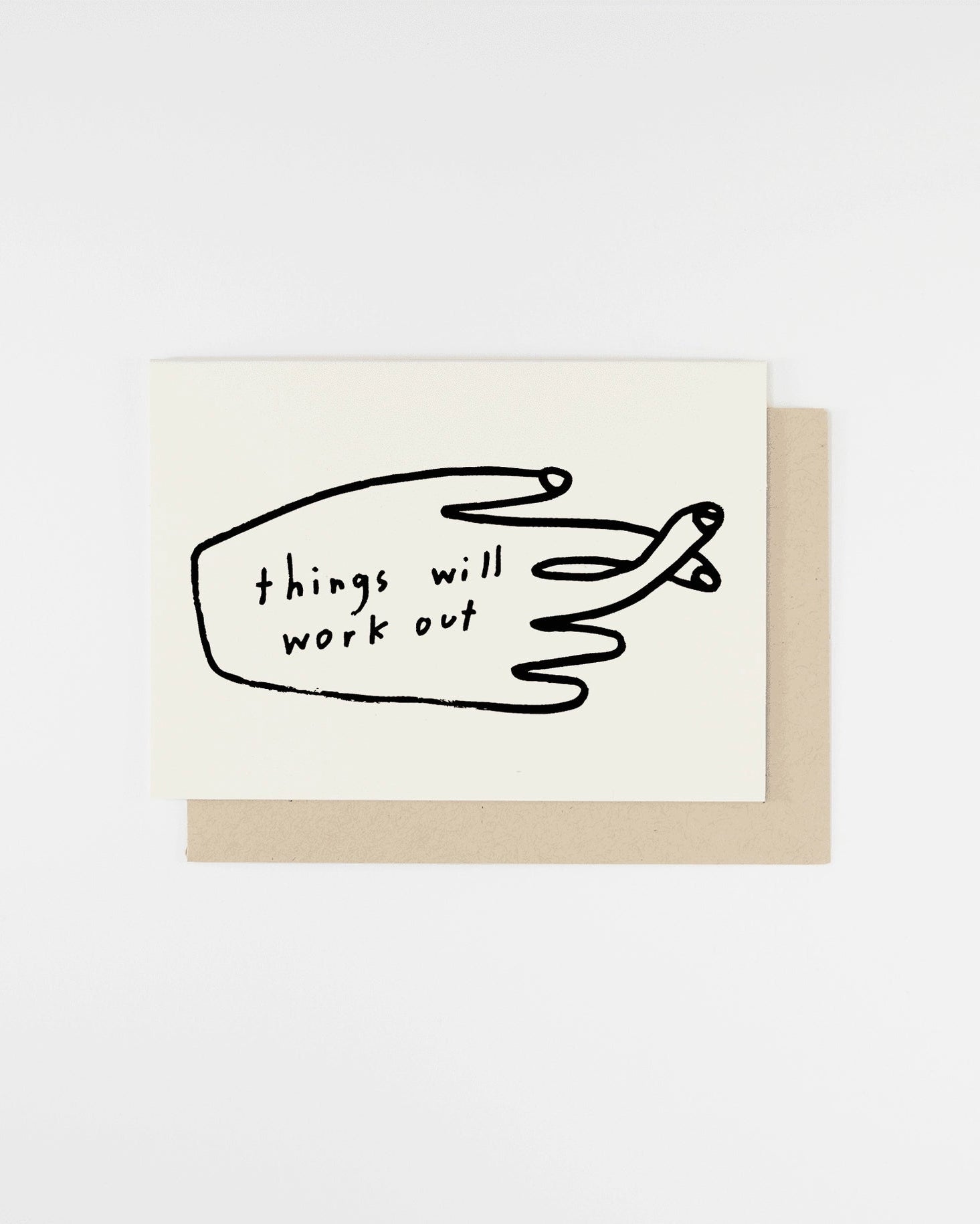 Minimalist encouragement card with simple hand illustration and the phrase ‘Things will work out,’ paired with light beige envelope.