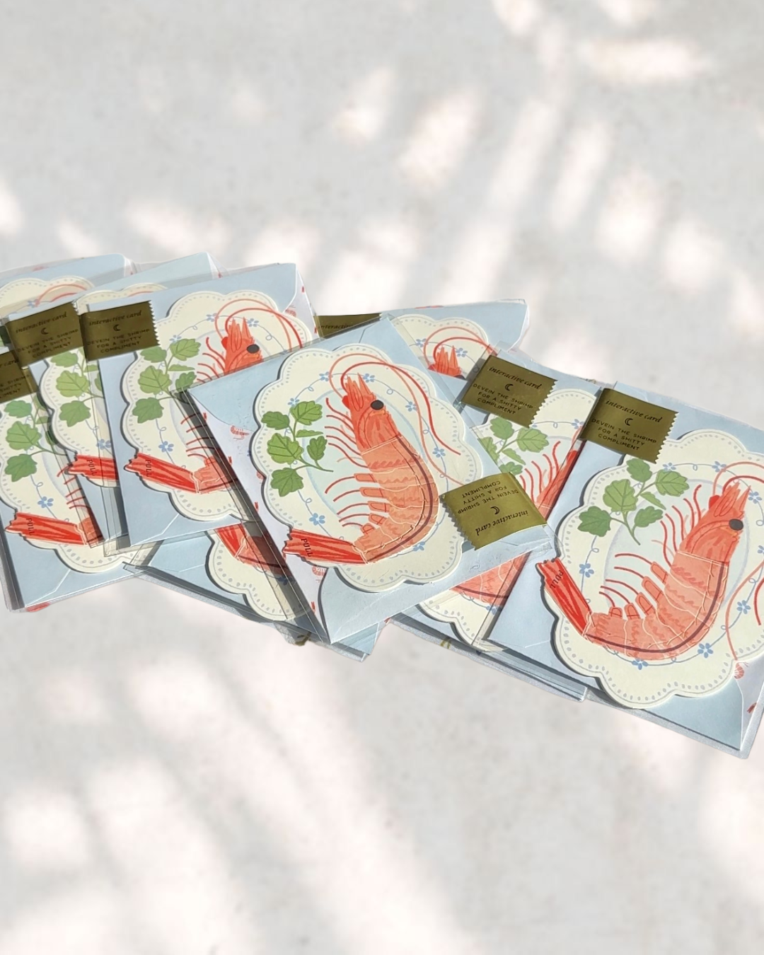 Close-up of peel-to-reveal shrimp pun – fun graduation or breakup card