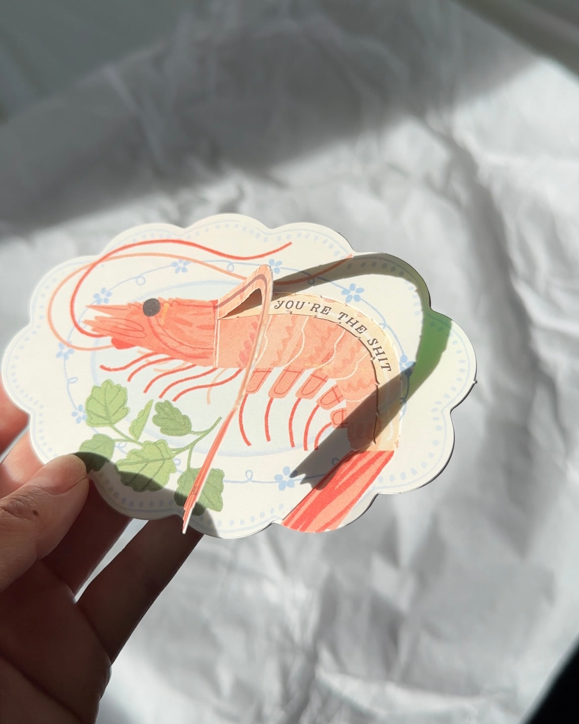 Funny shrimp greeting card with pull tab revealing “You’re the sht” message