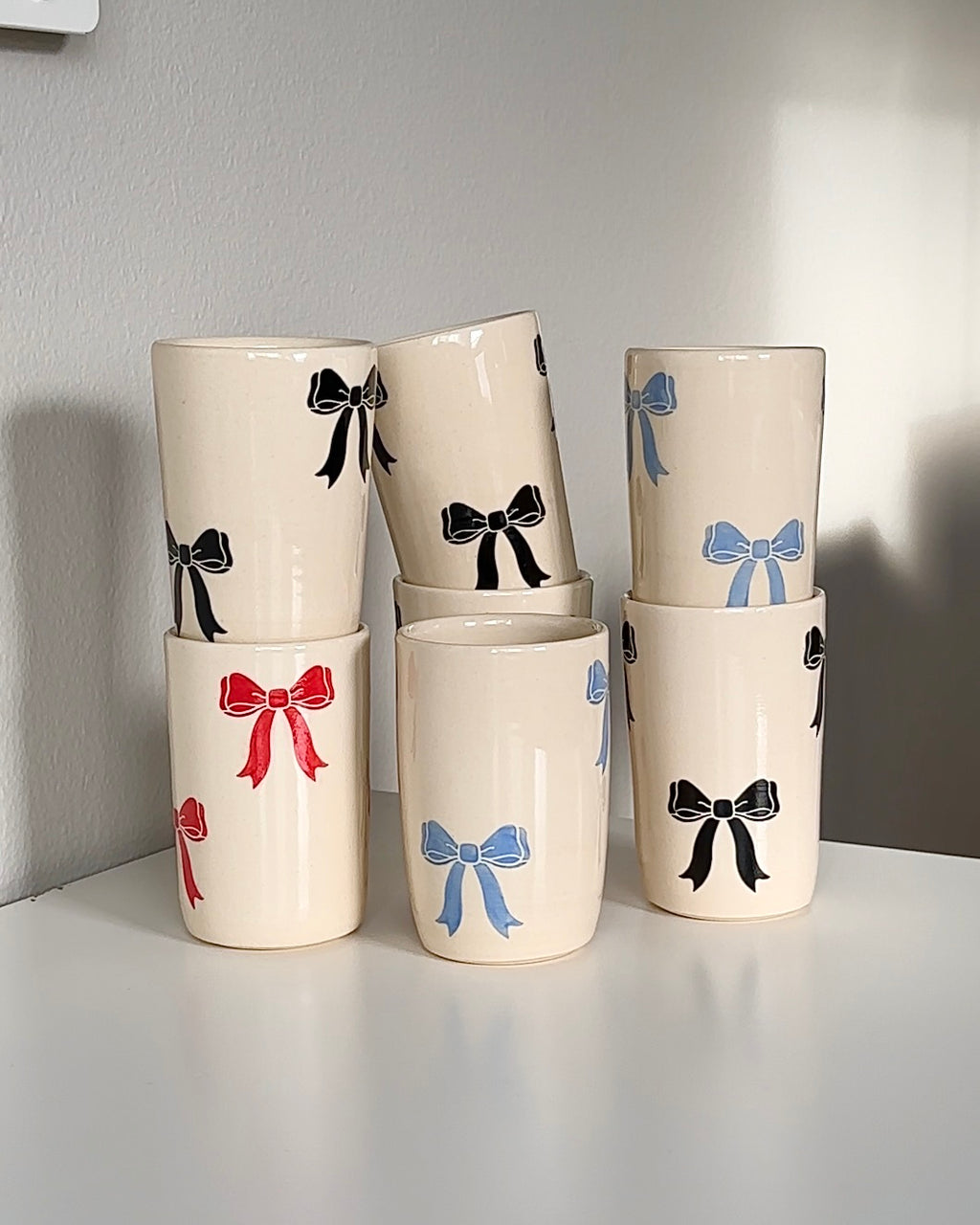 Blue Bow Ceramic Cup – Handmade Cottagecore Coquette Tumbler for Iced Coffee & Tea Lovers