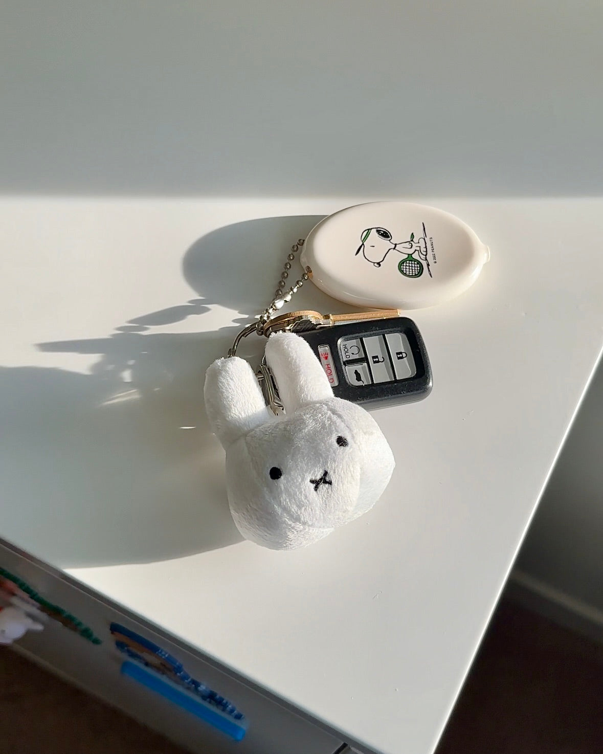 Snoopy Tennis Coin Pouch – Peanuts® Cream Keychain Wallet for Dorm & Campus Life