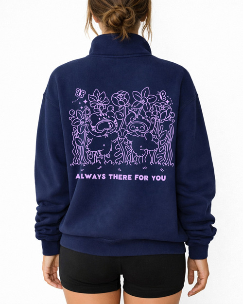 Back view of a navy quarter zip fleece pullover with a soft illustrated graphic of two companions surrounded by flowers and the phrase "Always there for you"
