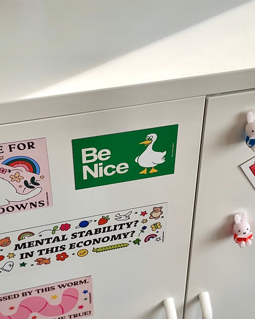 Be Nice goose magnet on a cabinet with positive stickers, kindness reminder magnet for fridge or office