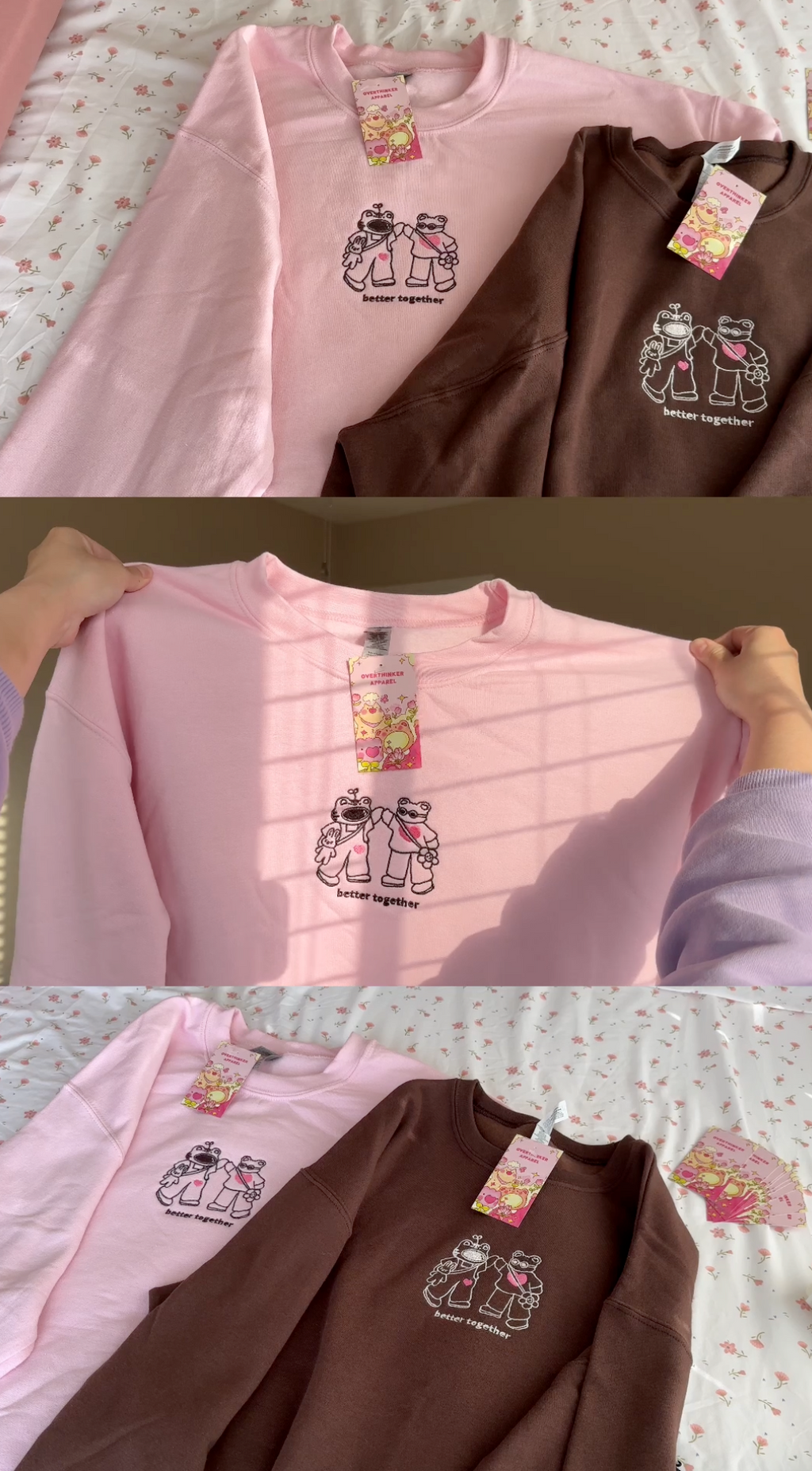 Pink embroidered crewneck sweatshirt held up in sunlight, featuring a soft character illustration and the words “better together.”