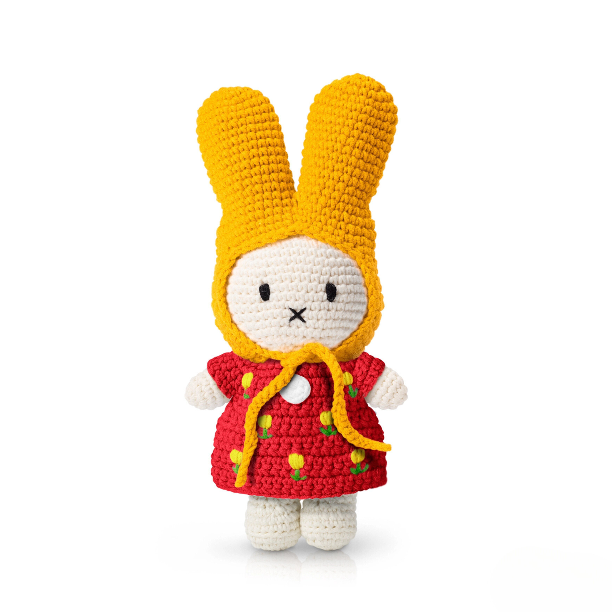 Detailed image of a handmade bunny doll in a yellow bonnet and bright red dress with yellow tulip stitching — cheerful, spring-inspired crochet plushie.
