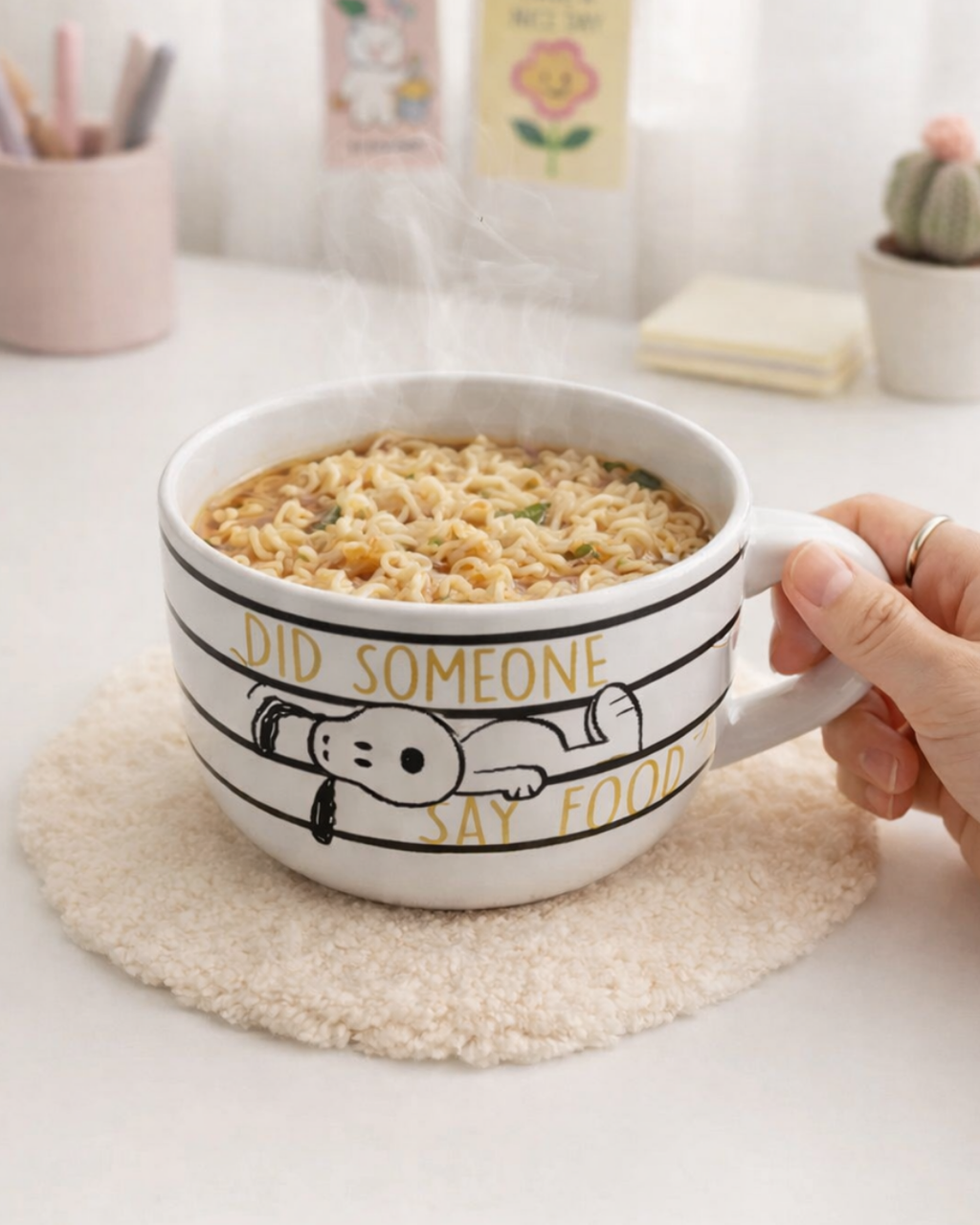 Cute Snoopy ramen bowl with cartoon Peanuts design filled with ramen noodles on kitchen table, ceramic noodle bowl for ramen soup and cozy meals
