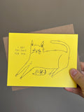 Funny yellow cat greeting card with hand-drawn cat presenting a dead mouse as a gift, captioned ‘I got this just for you…’ with brown kraft envelope.