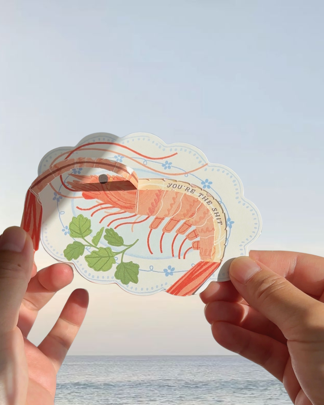 Funny shrimp greeting card with pull tab revealing “You’re the sht” message