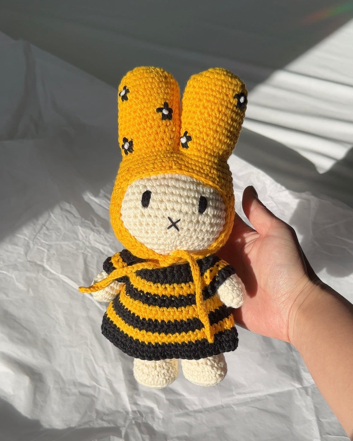 Handmade Miffy crochet plush in striped bee dress and floral bonnet