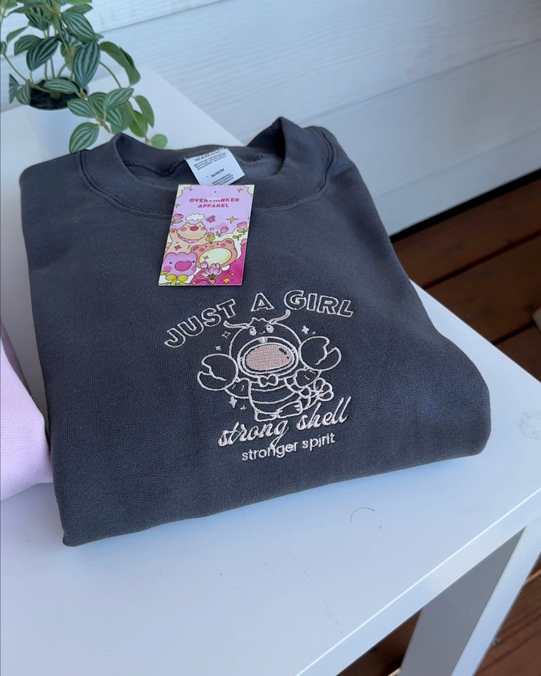 "Just A Girl: Strong Shell, Stronger Spirit" Embroidered Crewneck Sweatshirt - Oversized