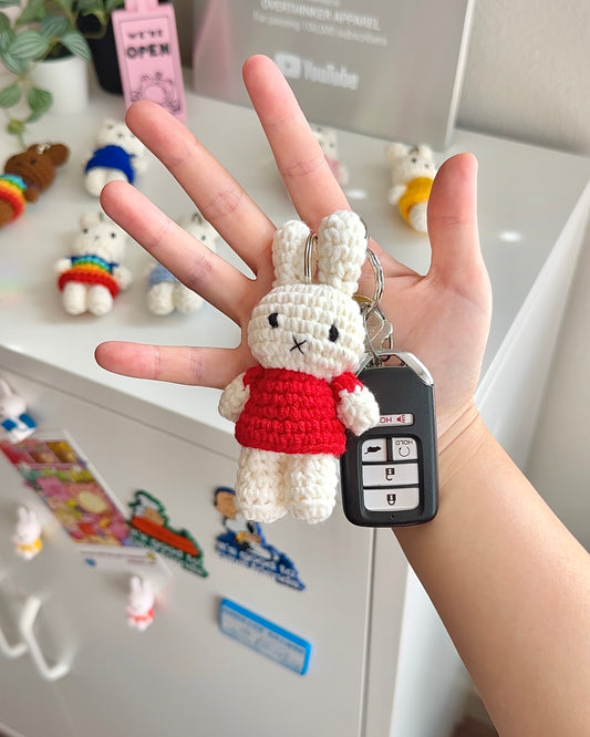 Cozy red Miffy plush keychain used as cute bag accessory