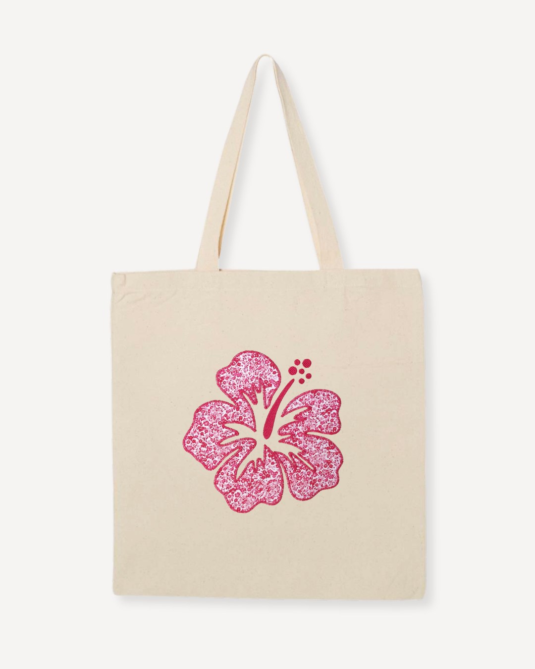 Natural canvas tote bag with pink hibiscus patchwork embroidery, regular size everyday floral tote for errands, market, or beach