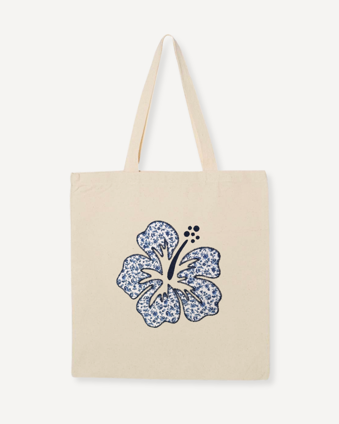 Natural canvas tote bag with navy hibiscus embroidery, regular size floral tote for everyday use, errands, or work