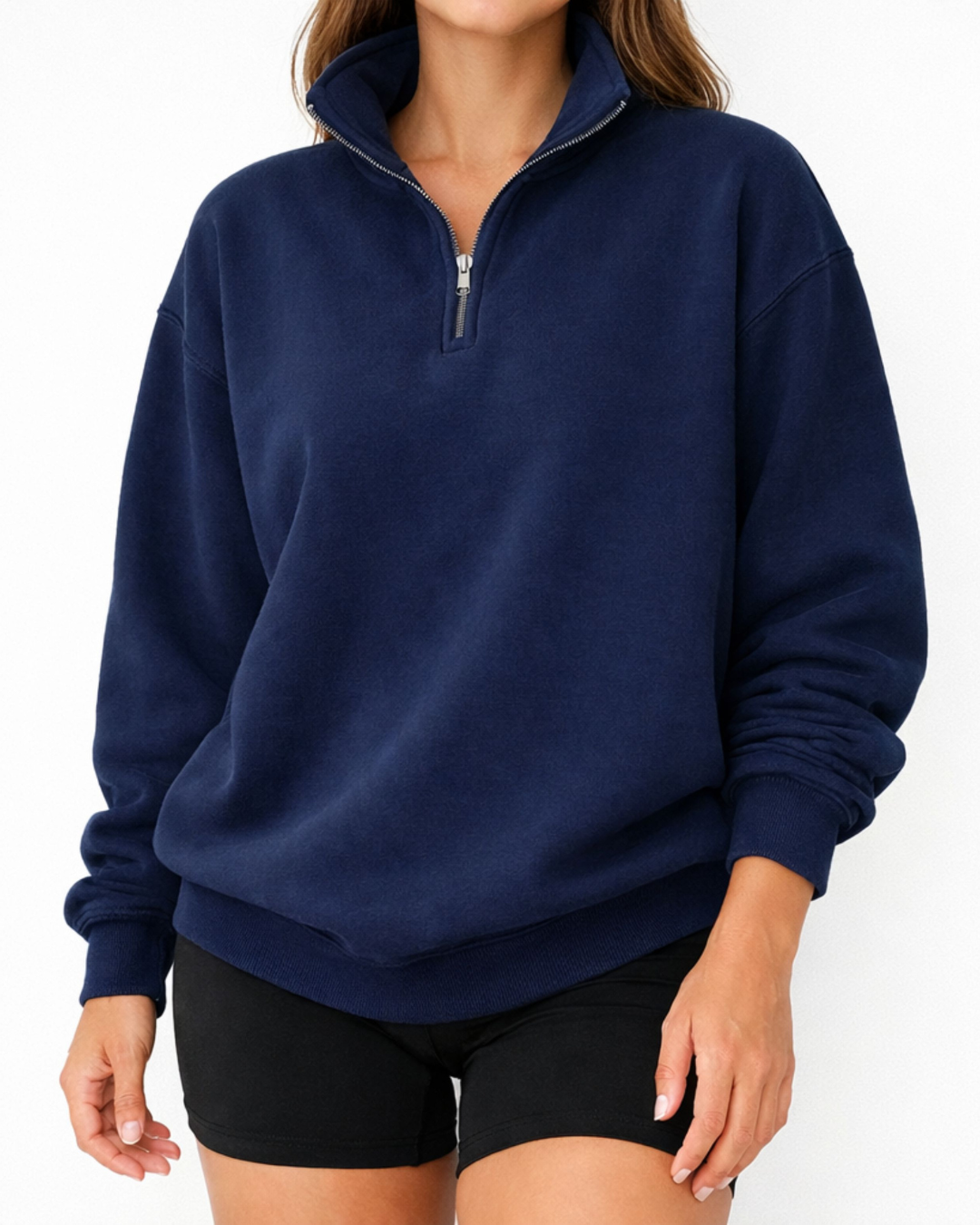 Front view of a navy quarter zip fleece pullover with a relaxed unisex fit, minimal design, and soft cozy fabric for everyday wear