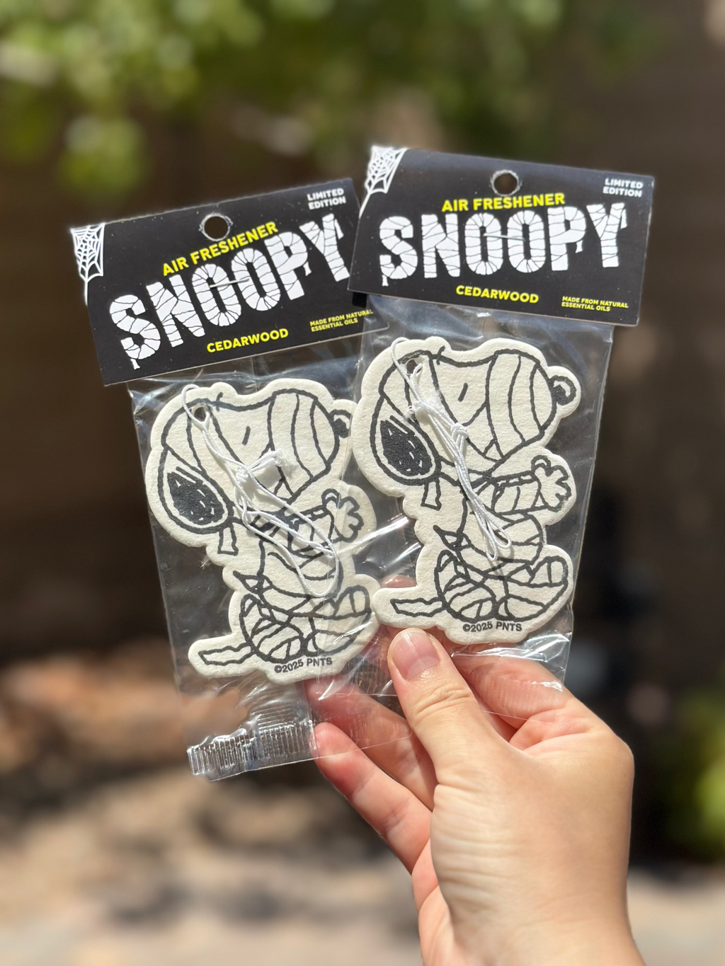 Snoopy cedarwood air fresheners featuring a Halloween mummy design