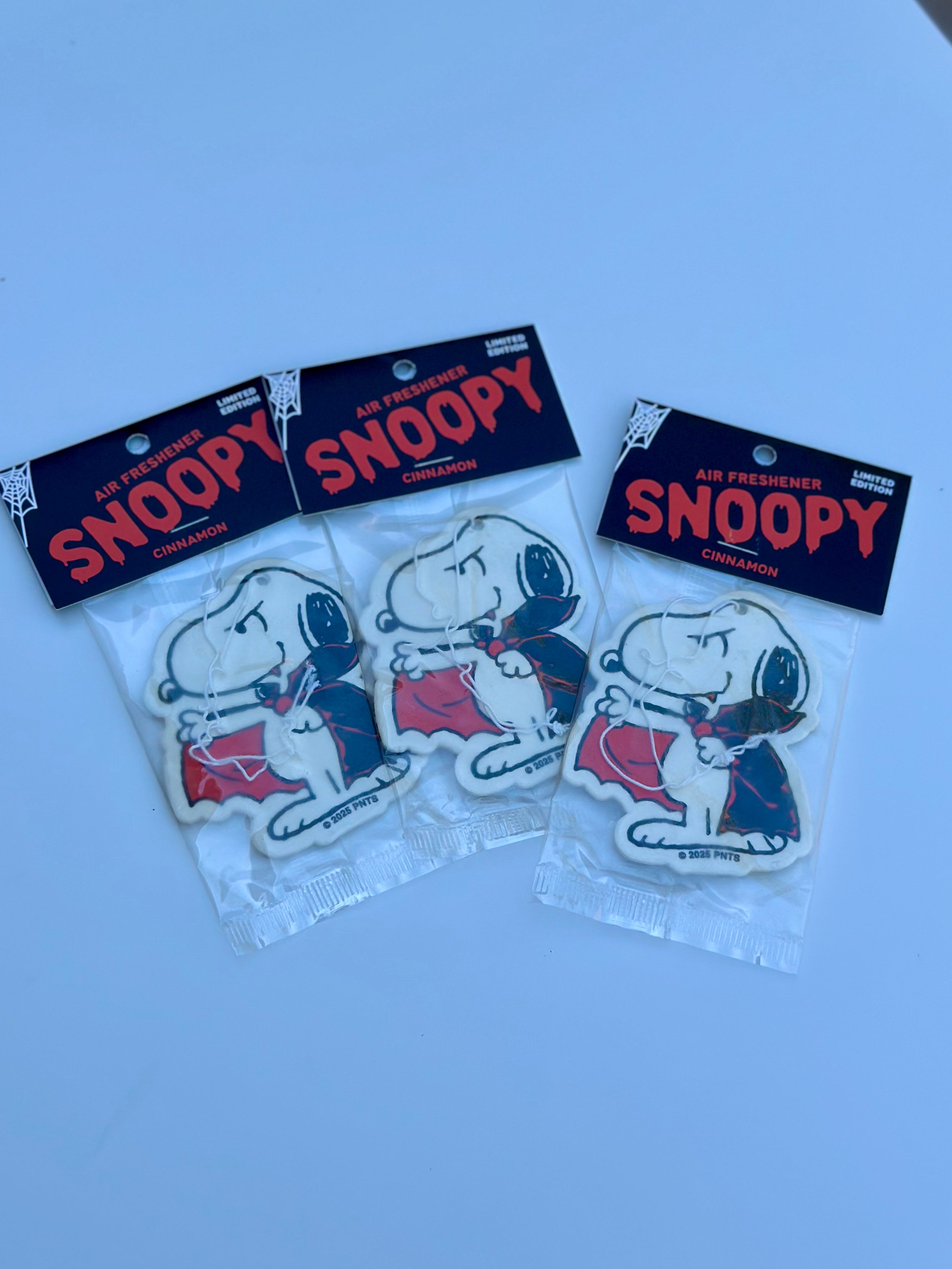 limited edition Snoopy cinnamon air fresheners with a playful vampire design—perfect for Halloween car decor, spooky season gifts, or Peanuts collectors.