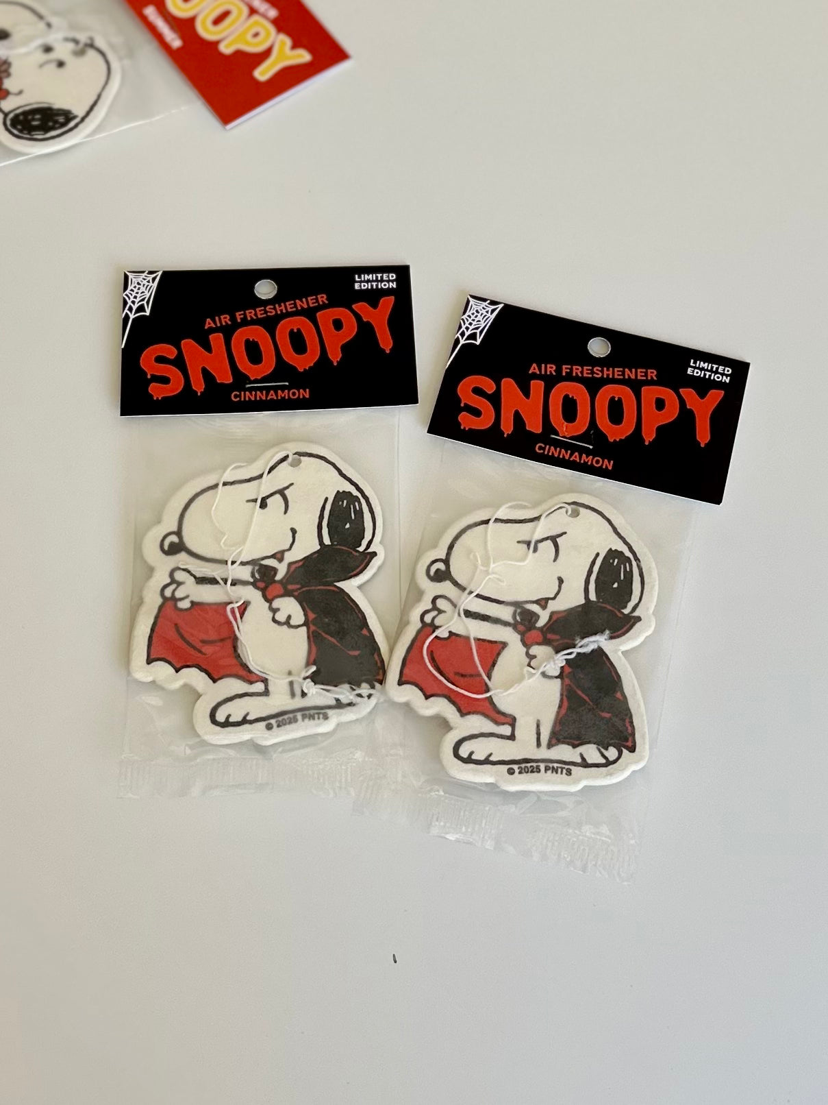 limited edition Snoopy cinnamon air fresheners with a playful vampire design—perfect for Halloween car decor, spooky season gifts, or Peanuts collectors.