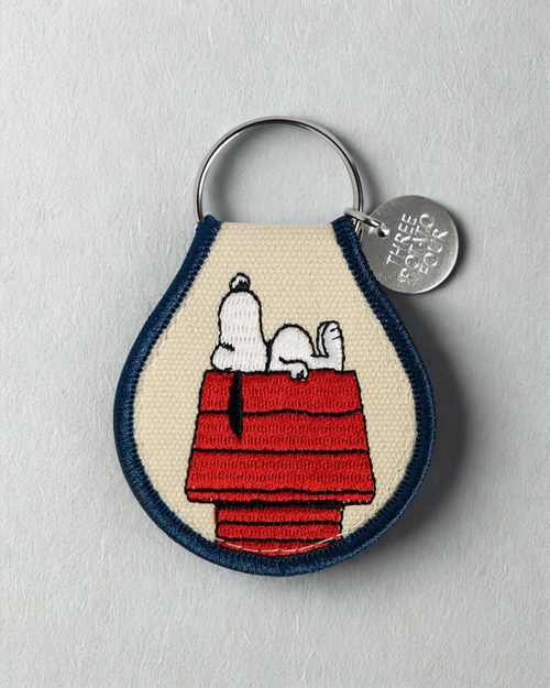 Embroidered Snoopy doghouse keychain inspired by Peanuts cartoon, cute Snoopy patch keychain bag charm accessory for backpack purse keys, Peanuts fan collectible gift
