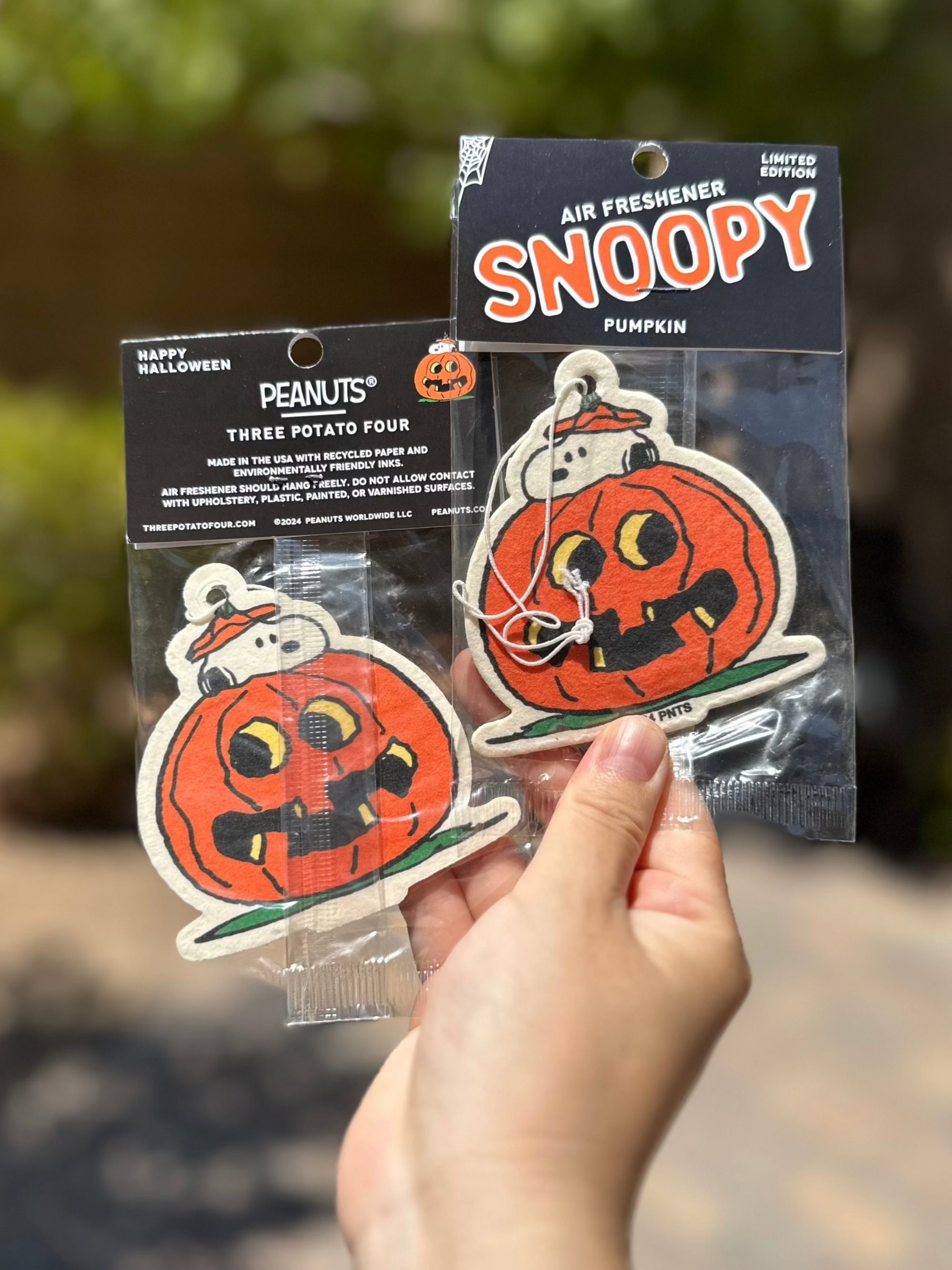 Limited edition Snoopy pumpkin air freshener featuring Snoopy peeking out from inside a carved jack-o’-lantern
