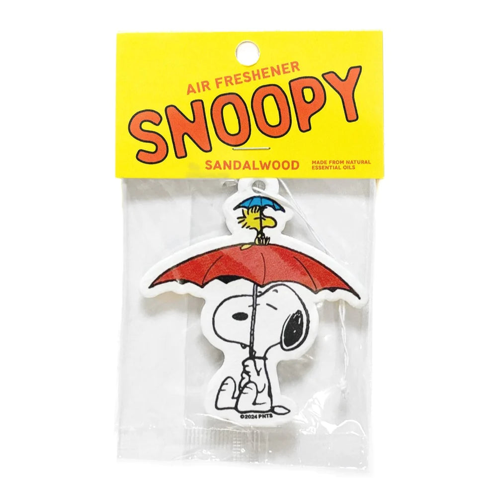 Snoopy and Woodstock umbrella air freshener with sandalwood scent. Packaged Peanuts merch made from recycled materials and essential oils.