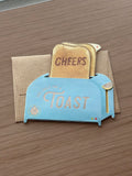 Interactive toaster greeting card with pop-up toast that says “Cheers” – fun celebration card for birthdays, weddings, anniversaries, and congratulations.